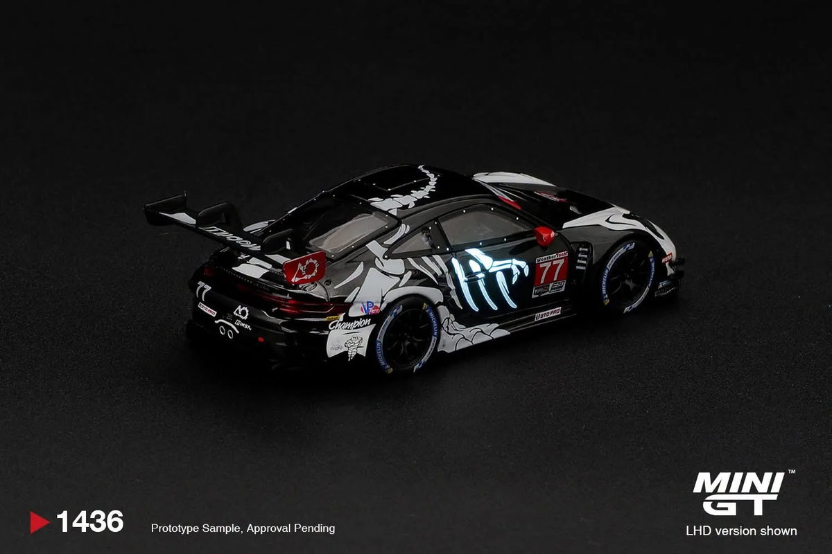 Mini GT 1:64 Porsche 911 GT3 R AO Racing “Skele-Glow Rexy” | Pre-Order